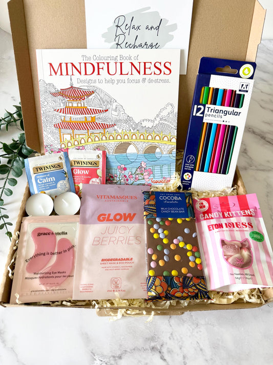 our distraction recovery get well soon gift includes a colouring book a set of 12 colouring pencils, a face sheet mask, a milk chocolate bar, under eye masks, herbal two (or select a different drink when ordering) candy kittens Eaton mess flavour and 2 tea light candles. with your chosen gift card and a personalised message ready to send direct to the recipient
